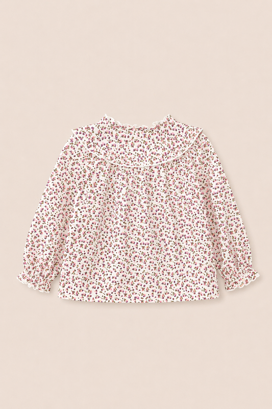 Blouse bébé fleurie à col volant – Raffinement & douceur