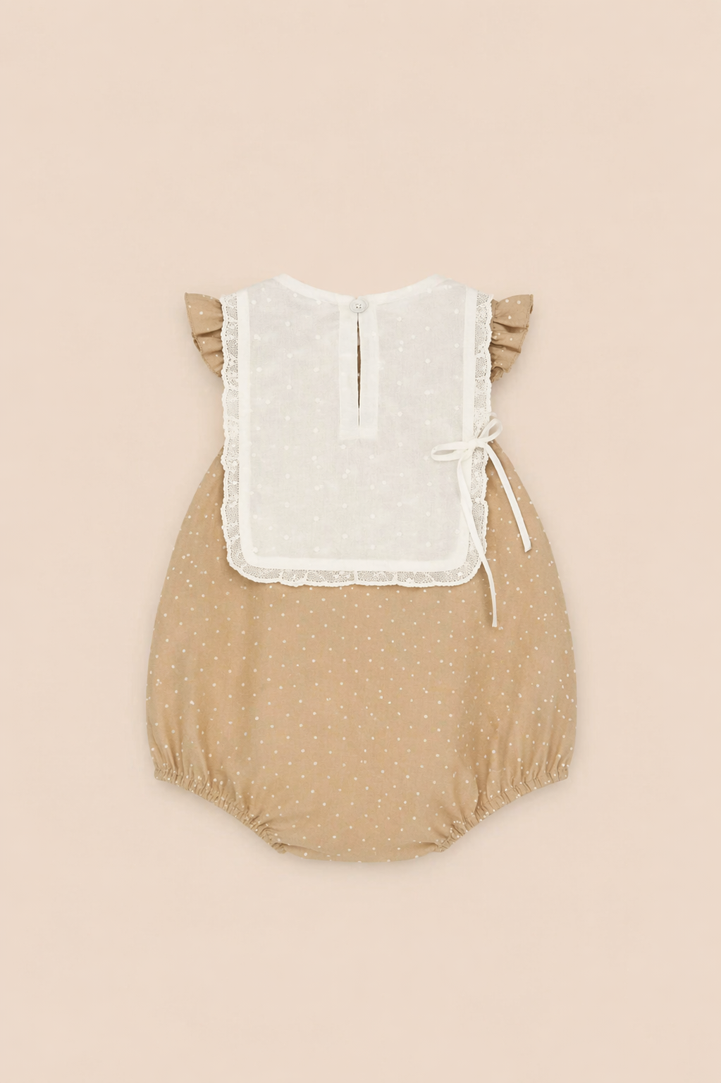 Barboteuse beige à pois – Douceur & charme intemporel