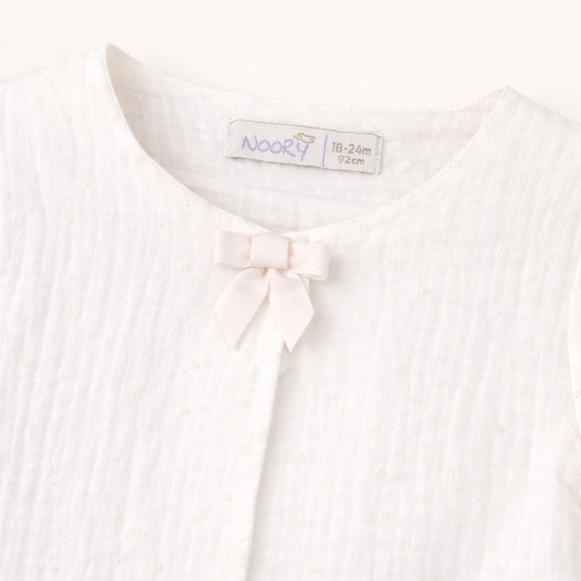 Veste bébé écrue en gaze de coton – Élégance & légèreté