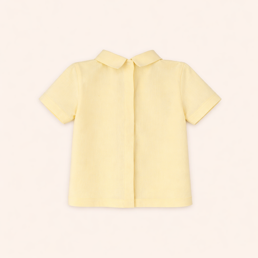 Blouse bébé jaune pâle à col imprimé – Douceur & style minimaliste