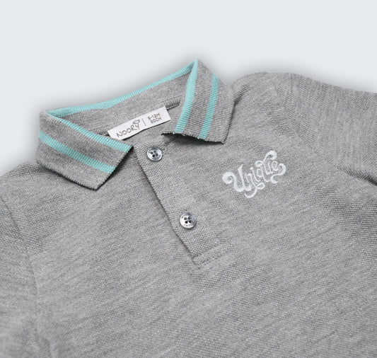 Polo body en piqué 100% coton à col chemisier et broderie