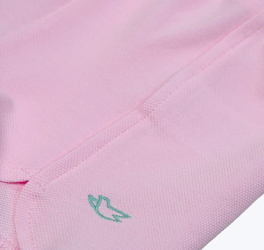 Short en piqué rose à découpe et broderie colombe