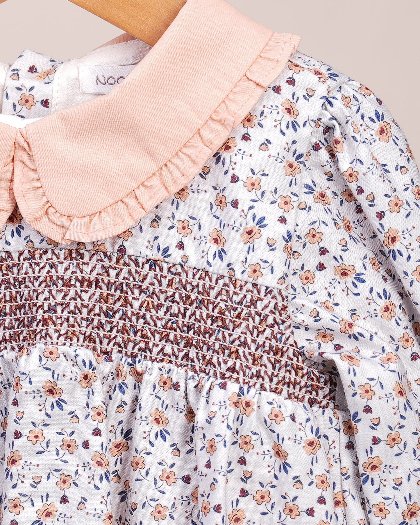 Robe bébé fille – Imprimé fleuri & col contrasté pêche