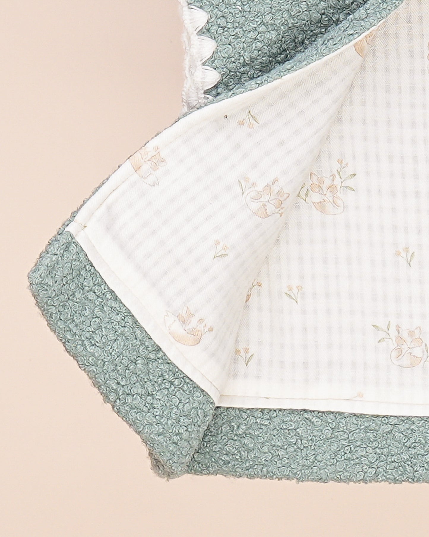 Gilet bébé sans manches en tissu bouclette