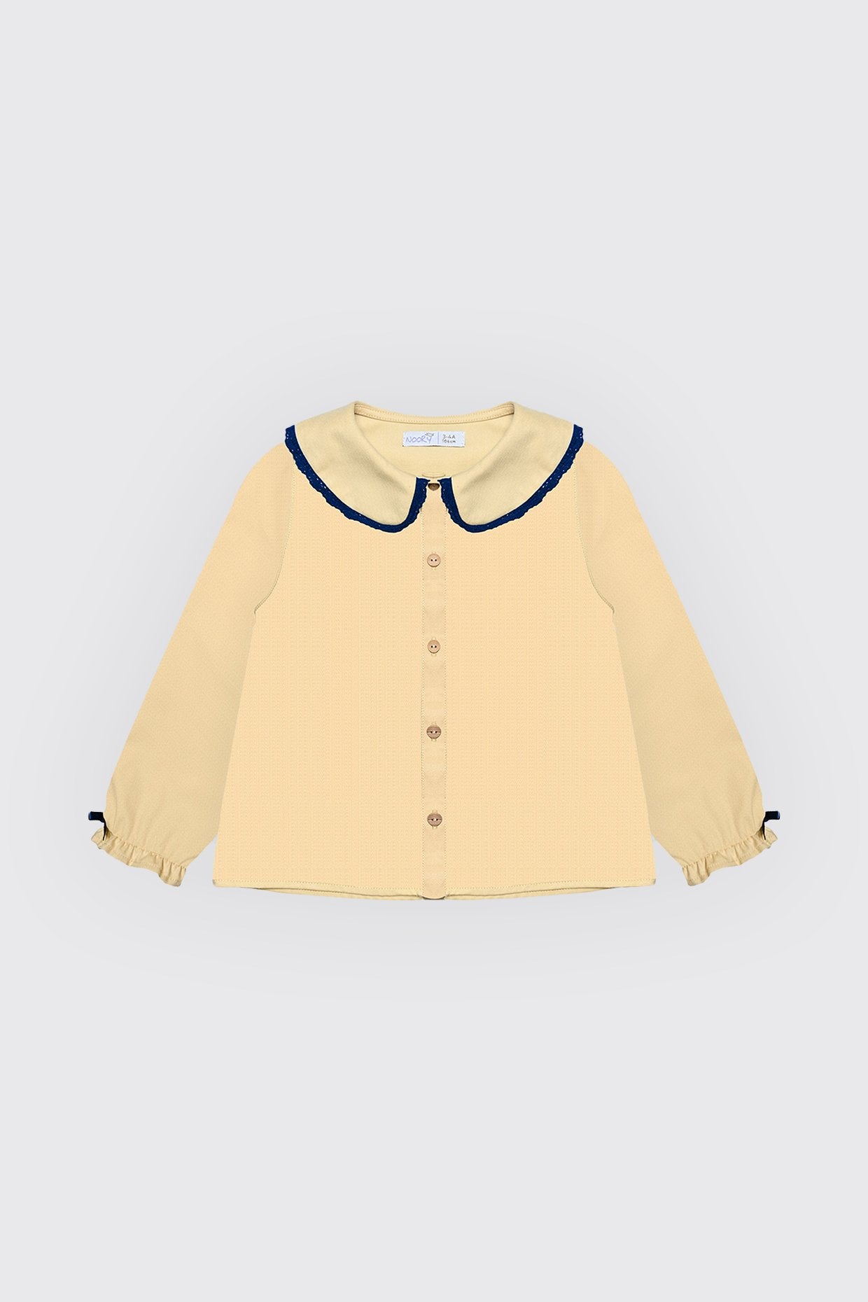 Chemise jaune pour fille.