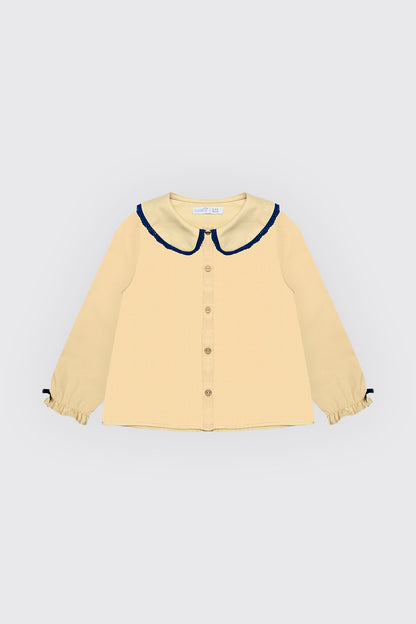 Chemise jaune pour fille.