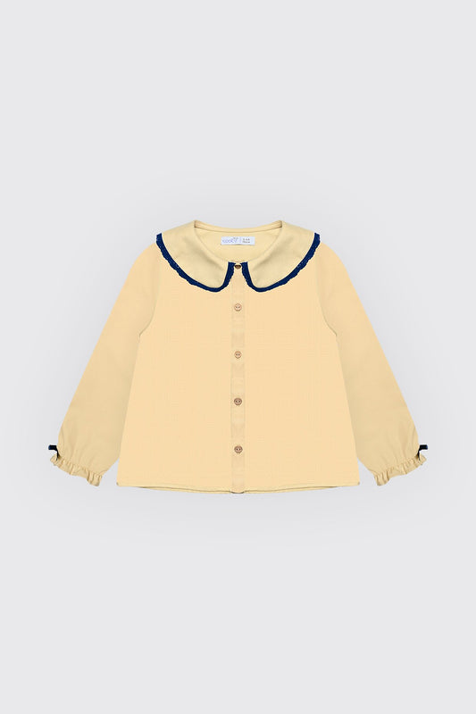 Chemise jaune pour fille.
