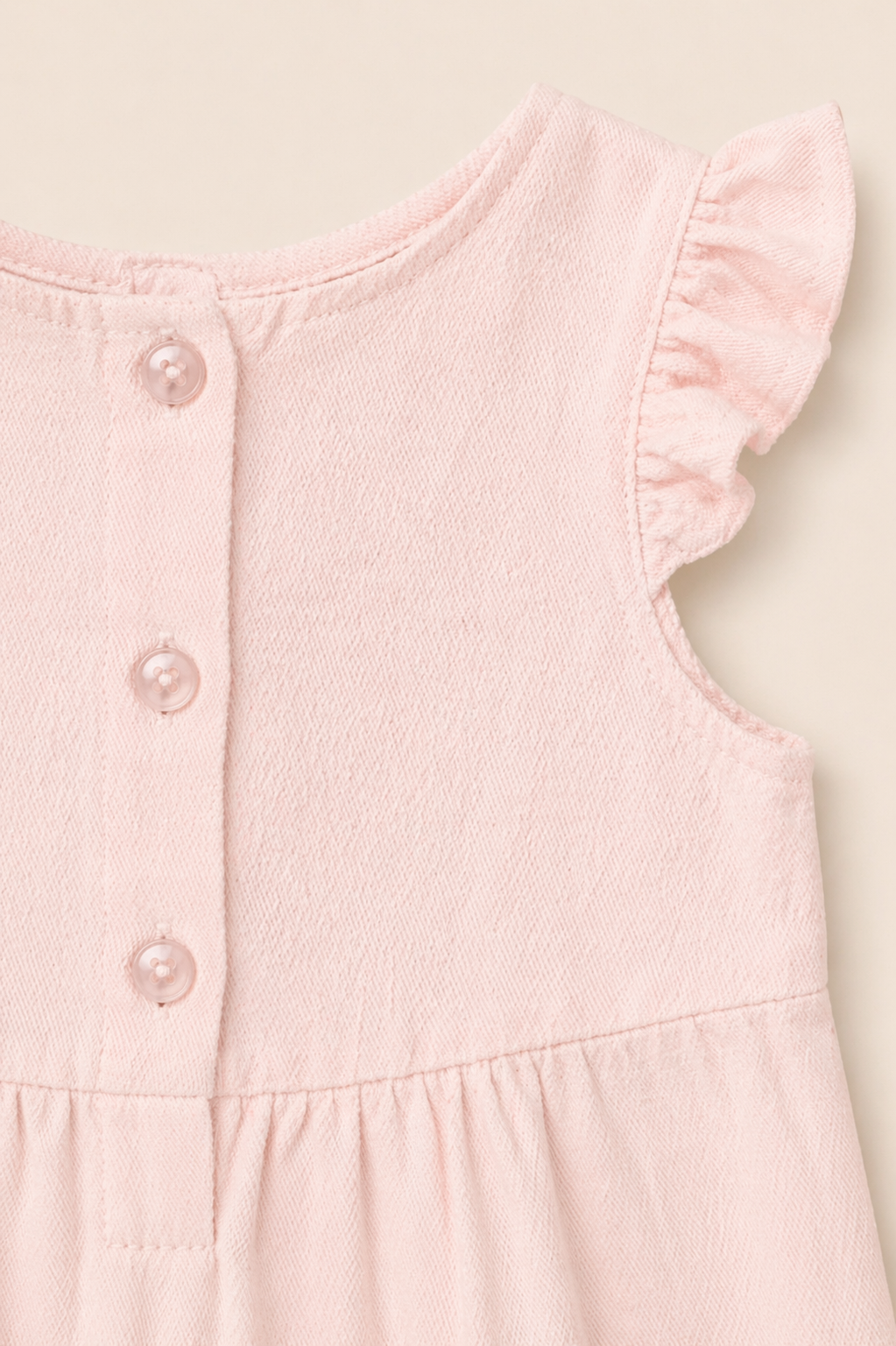 Combinaison bébé rose poudré – Douceur & élégance minimaliste
