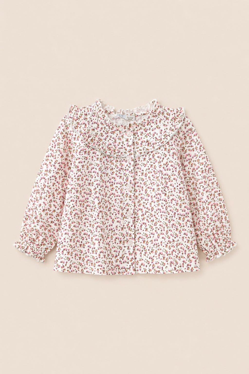 Blouse bébé fleurie à col volant – Raffinement & douceur