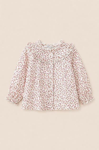 Blouse bébé fleurie à col volant – Raffinement & douceur