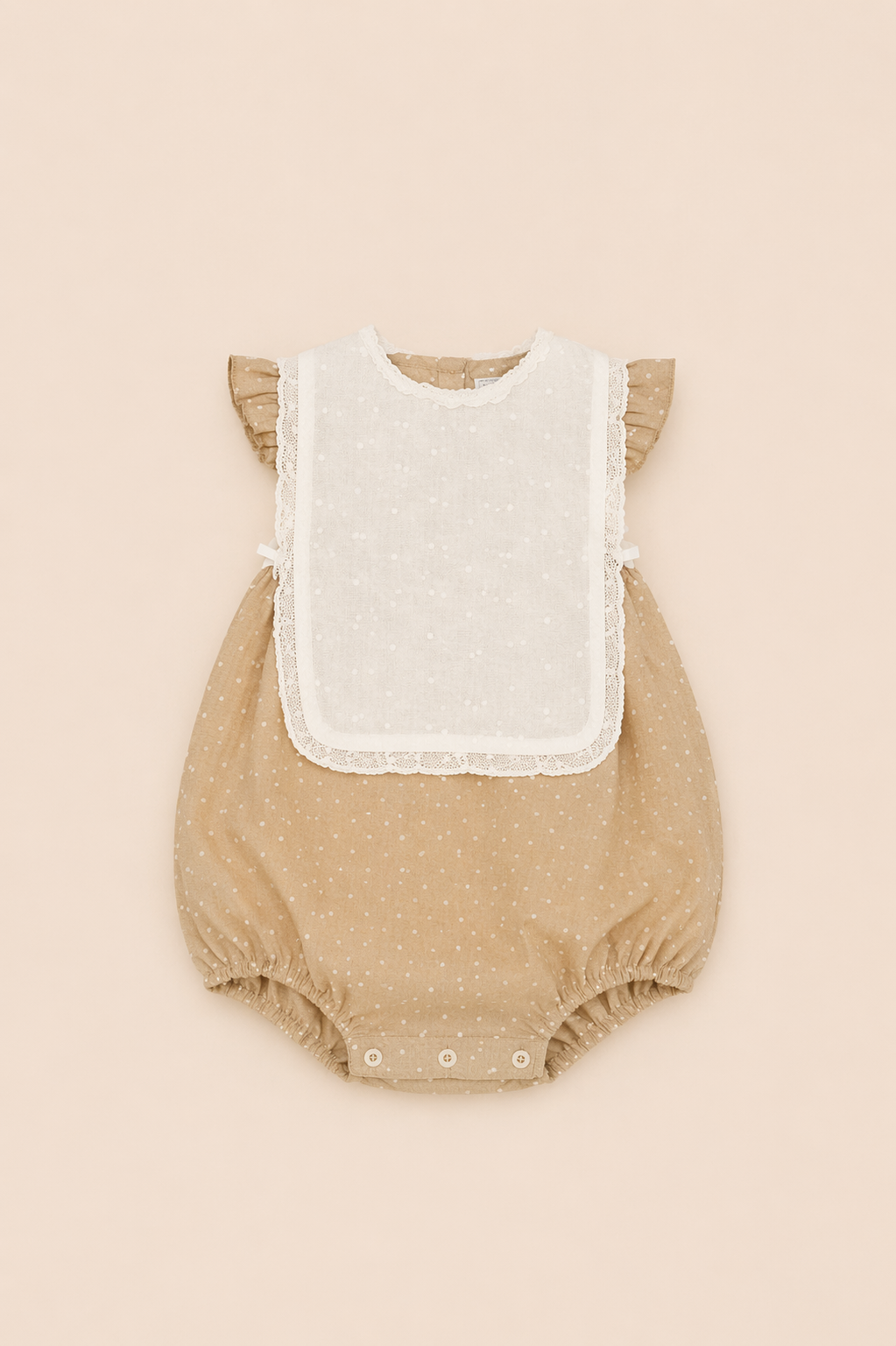 Barboteuse beige à pois – Douceur & charme intemporel