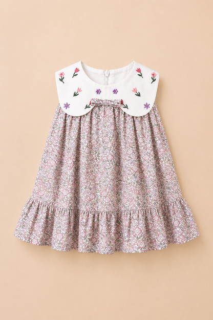Robe bébé – Élégance florale