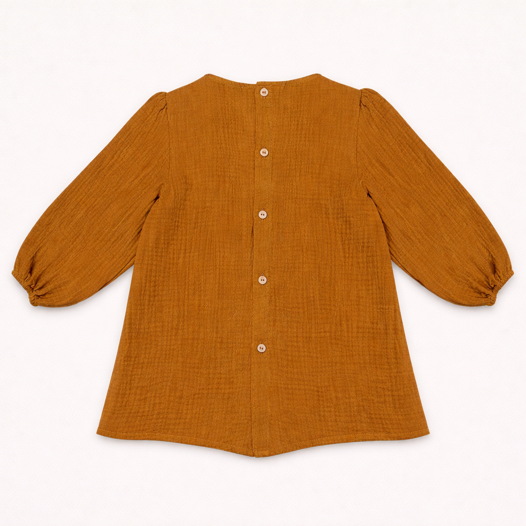 Blouse bébé terracotta à volants – Douceur & style bohème