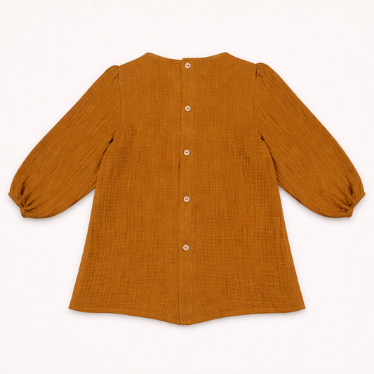 Blouse bébé terracotta à volants – Douceur & style bohème