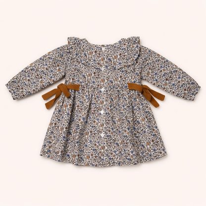 Blouse bébé fleurie avec nœuds – Élégance bohème & douceur