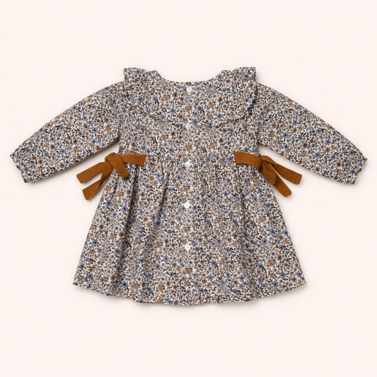 Blouse bébé fleurie avec nœuds – Élégance bohème & douceur