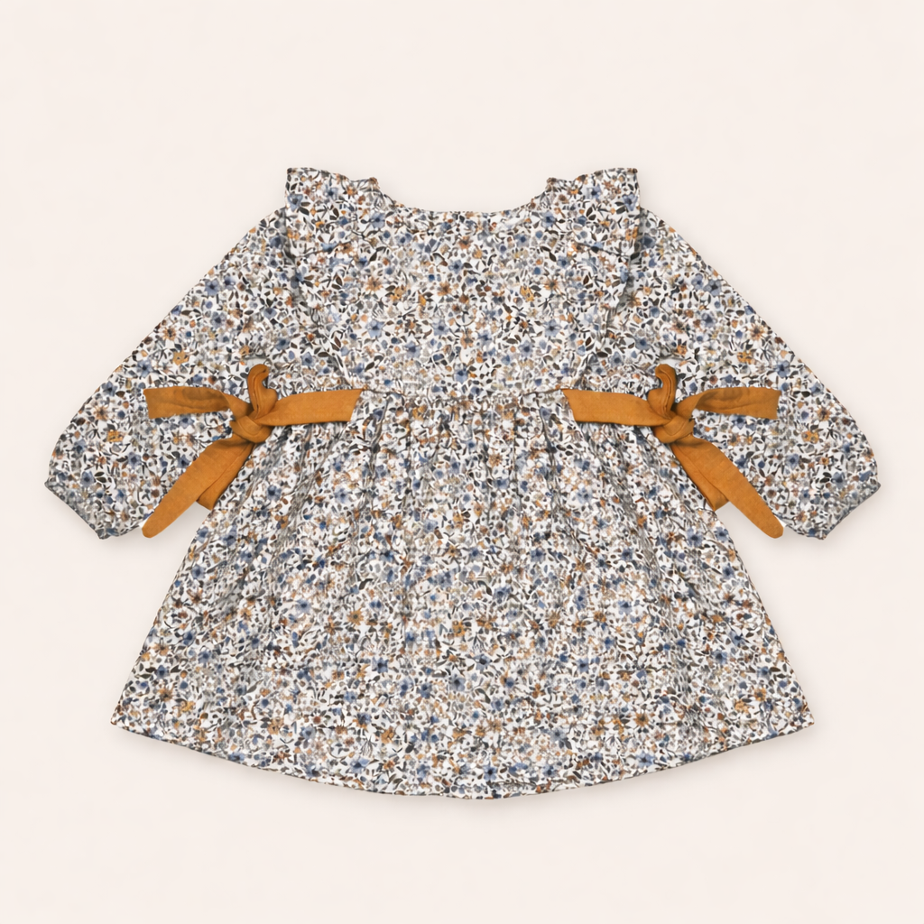 Blouse bébé fleurie avec nœuds – Élégance bohème & douceur