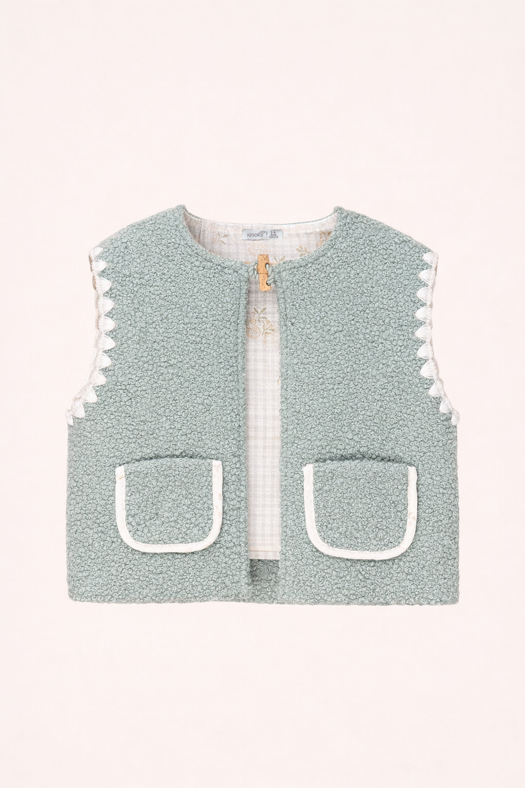 Gilet bébé sans manches en tissu bouclette