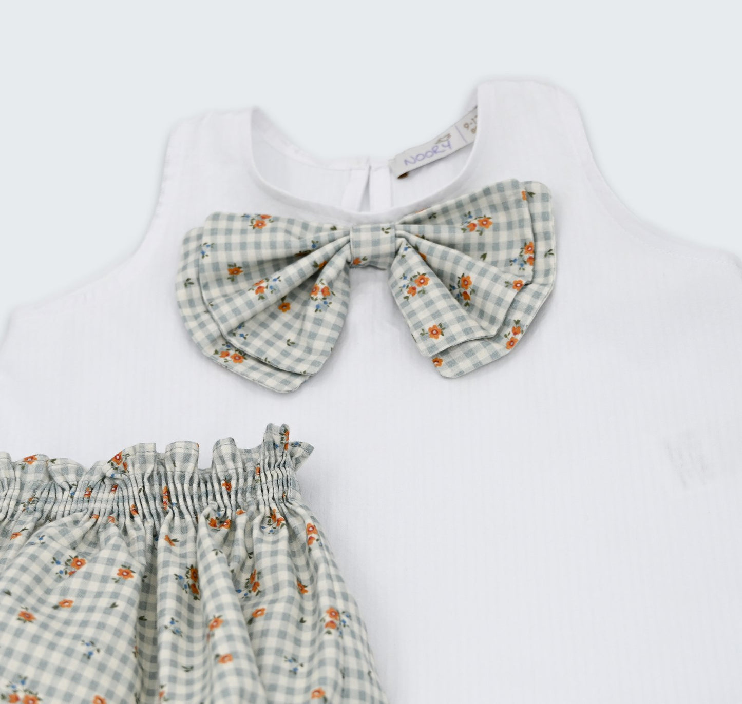 Haut à noeud avec bloomer en smock