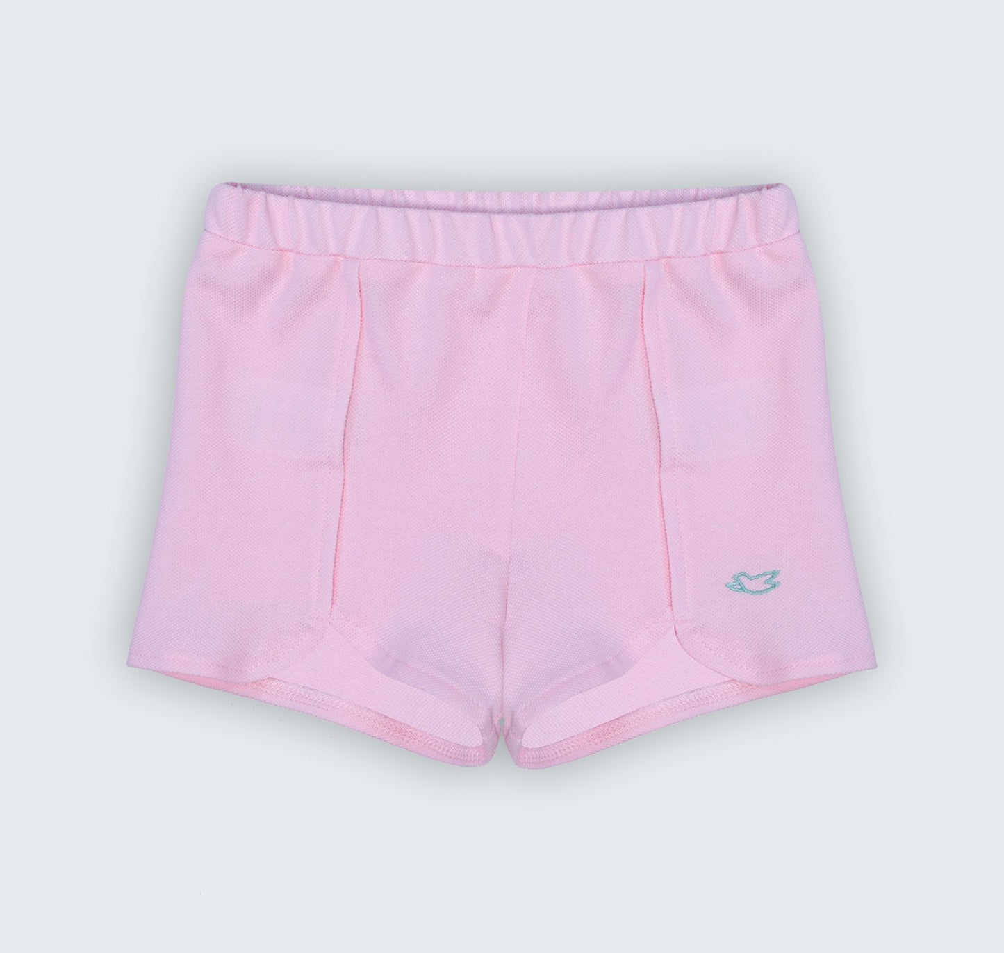 Short en piqué rose à découpe et broderie colombe