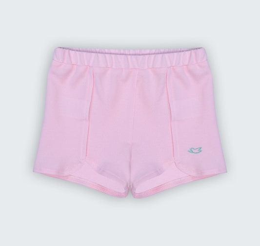 Short en piqué rose à découpe et broderie colombe
