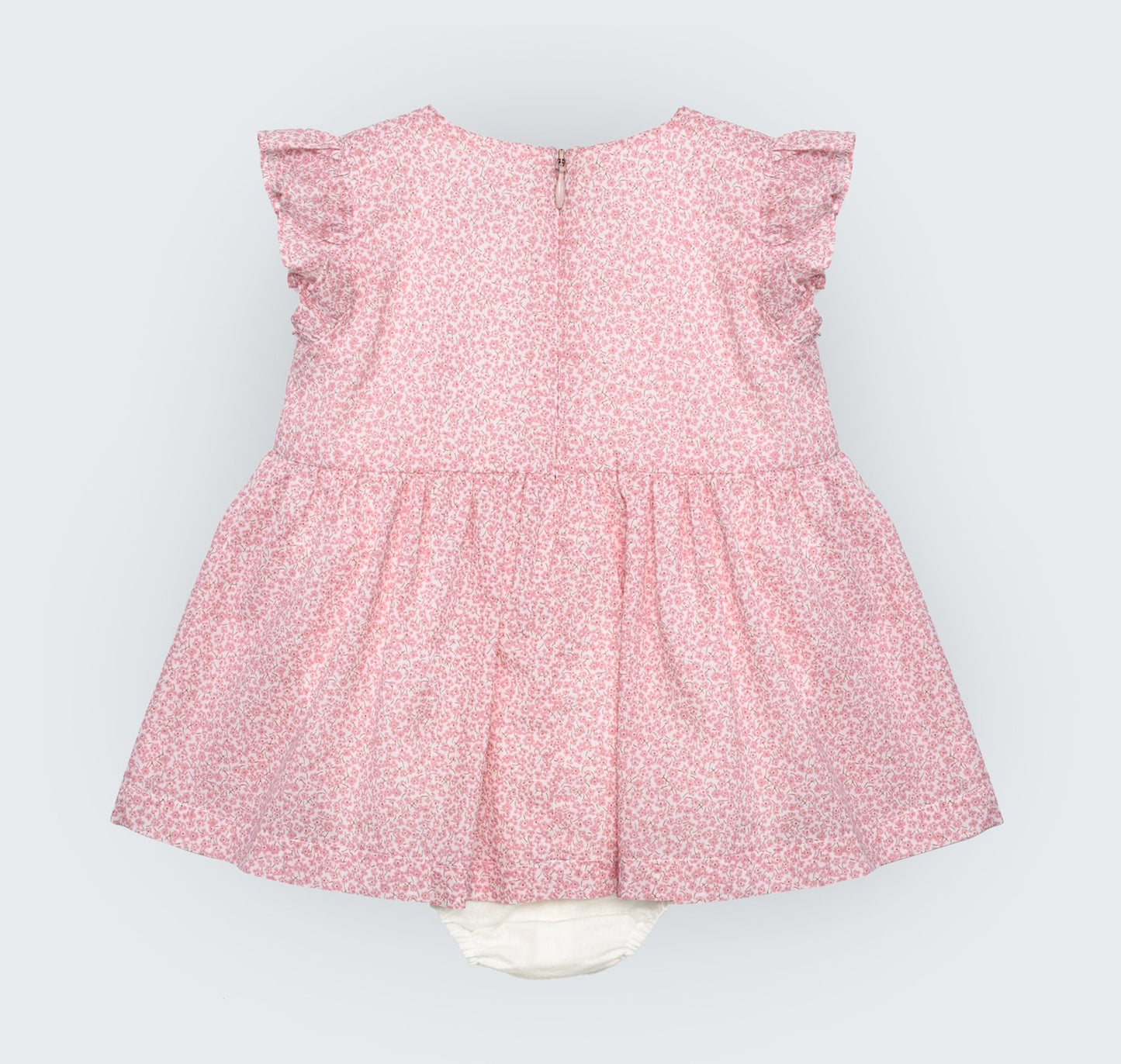 Robe culotte en popeline rose et beige fleuri à manches volantées