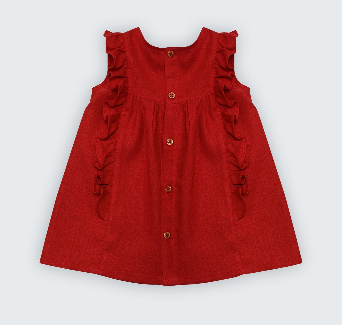 Robe en lin corail avec volant et galon macramé sur le devant