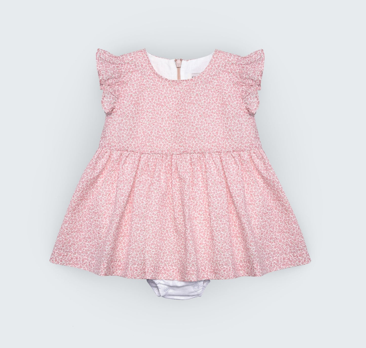 Robe culotte en popeline rose et beige fleuri à manches volantées