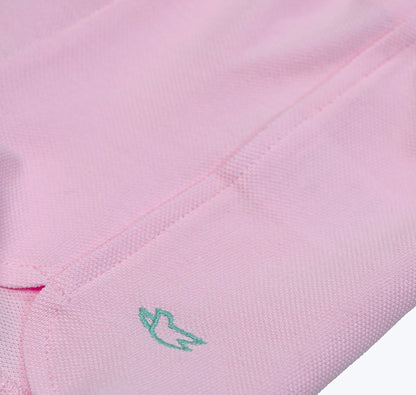 Short en piqué rose à découpe et broderie colombe