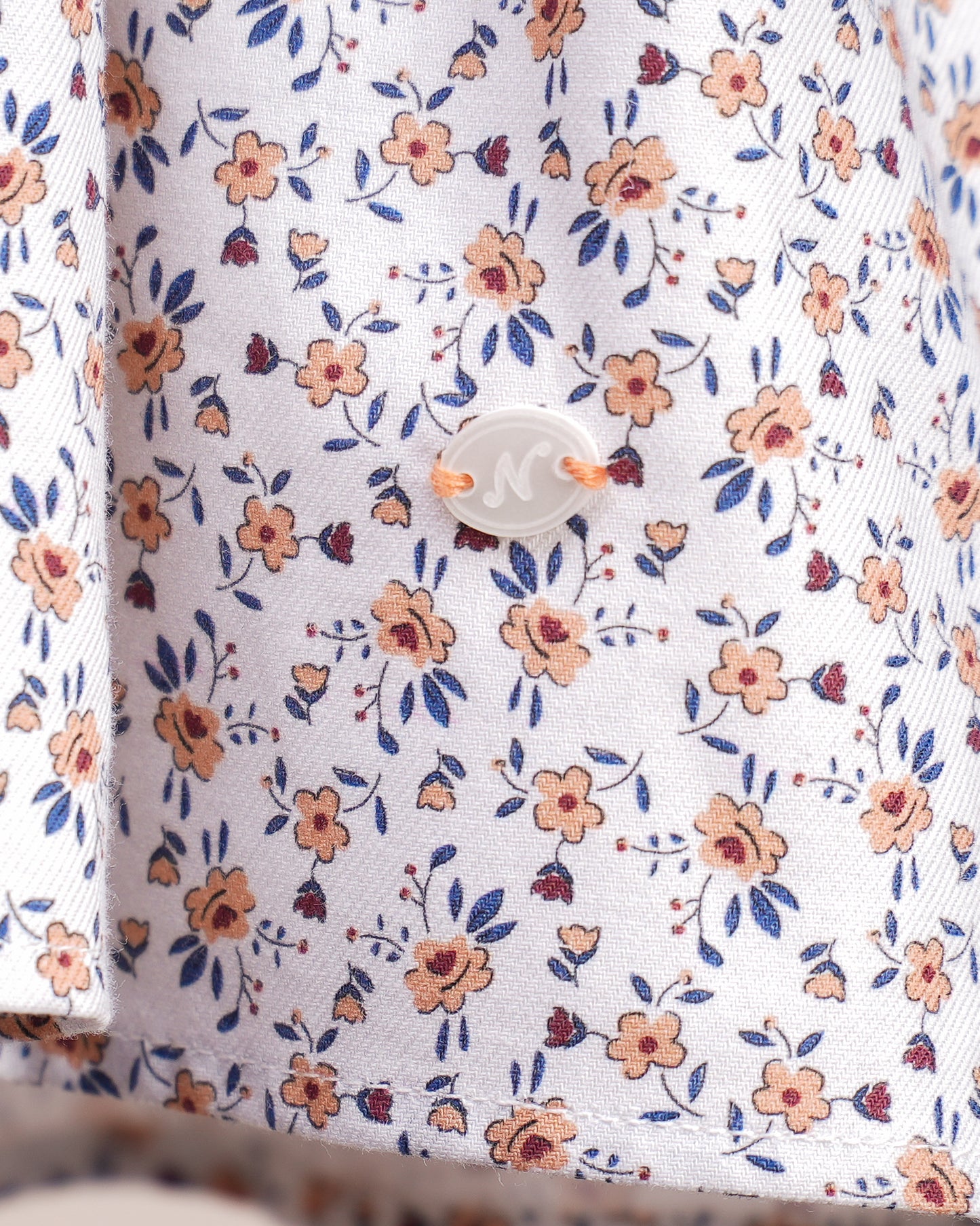 Robe bébé fille – Imprimé fleuri & col contrasté pêche