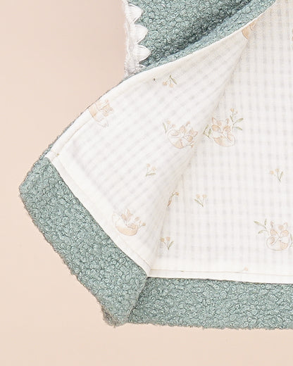 Gilet bébé sans manches en tissu bouclette