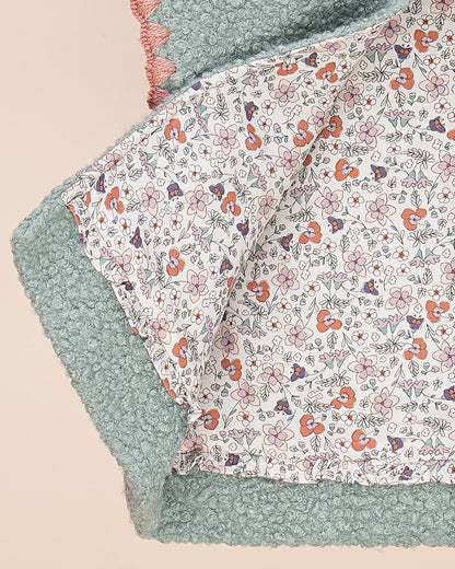 Gilet bébé sans manches en tissu bouclette – Doublure fleurie