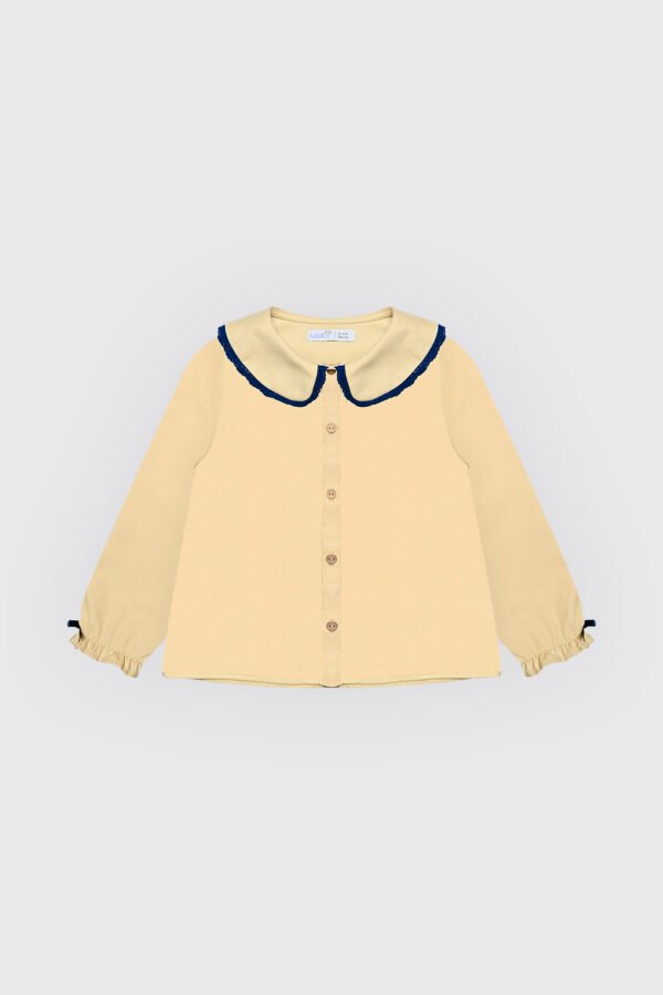 Chemise jaune pour fille.