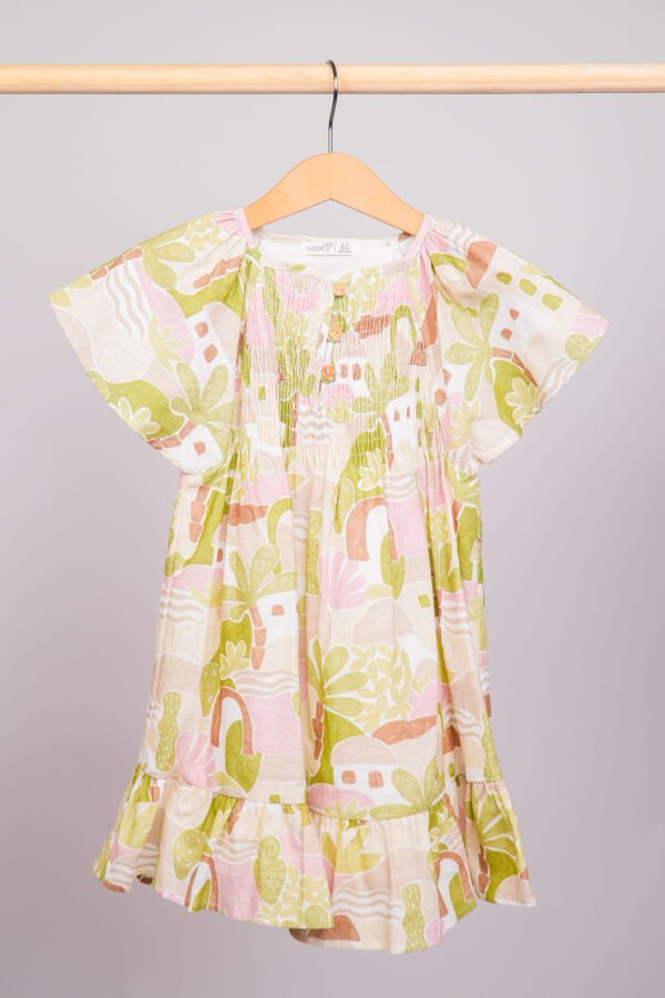 Robe avec manches papillon et son haut smocké délicat
